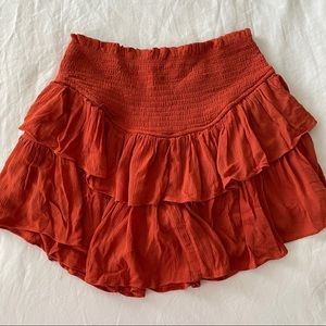 Mustard Seed Smocked Ruffle Mini Skirt with Shorts Rust